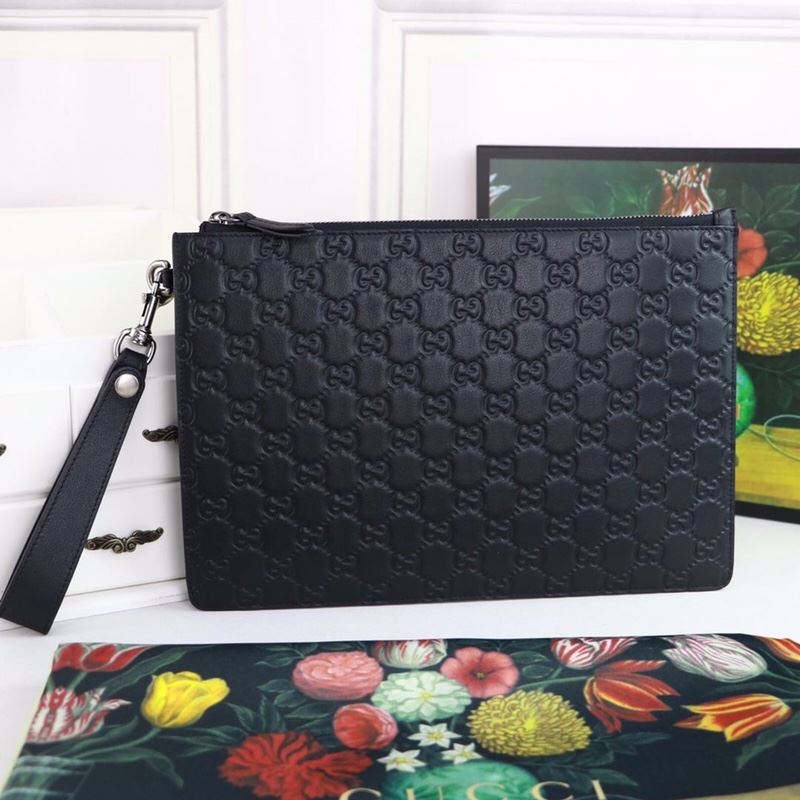 G*u*i clutch bags